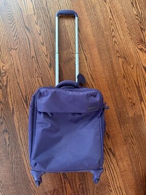 Lipault Plume original carry-on spinner suitcase, color: plum